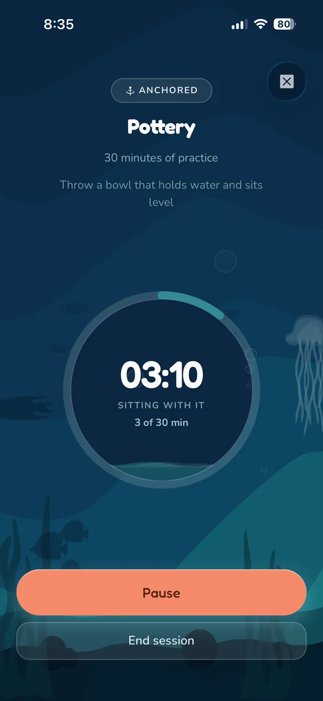 A running session: a timer reading 03:10 inside a progress ring, on a dark underwater scene with fish and seaweed.